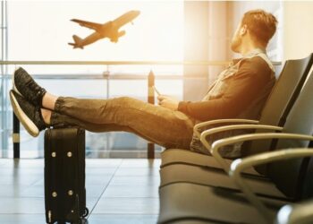 Serious allegations against a travel agency located near CG Road in Ahmedabad, discussion of involvement in a secret racket, money laundering and foreign funding